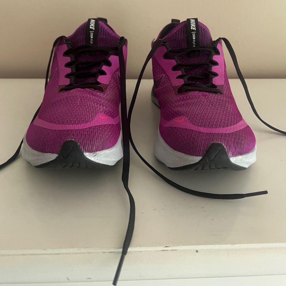 Nike Pink and Black Athletic Shoes for Performance